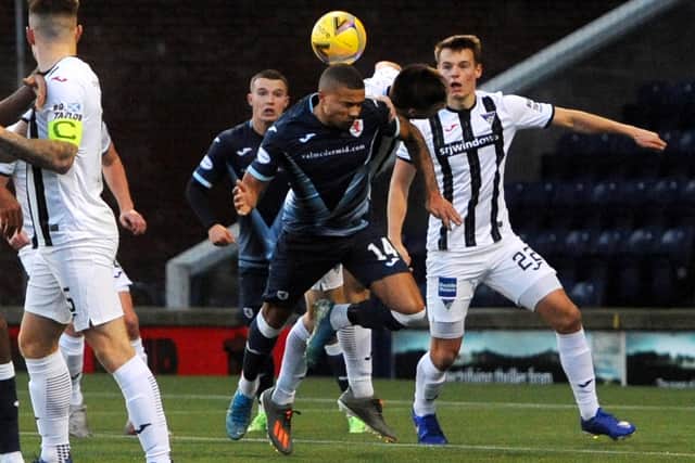 Musonda challenges in the  Pars box (Pic: Fife Photo Agency)