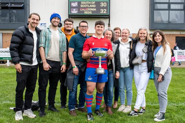 New Howe of Fife captain Fraser Allan celebrating with dad Adrian and mum Jennifer and pals including previous Howe skipper Jamie Thomson, second from left, after helping Caledonia Reds win their first Scottish inter-district rugby championship since 2000 against South of Scotland at Braidholm in Glasgow on Sunday (Photo: Bryan Robertson)