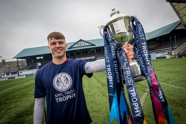 Ethan Ross with the cup at Stark's Park. (Pic: © Craig Watson)