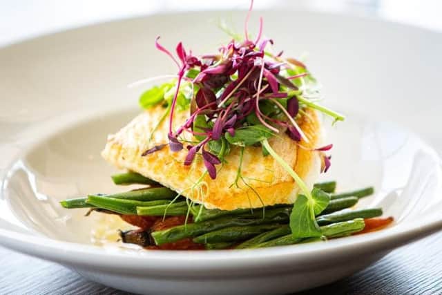 The club's signature halibut dish sourced sustainably from the coast of Orkney.