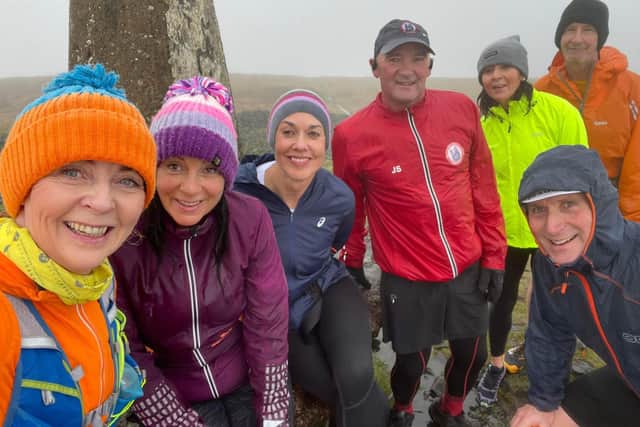 Kirkcaldy Wizards at the summit of West Lomond for a Saturday morning social run