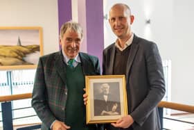 William Garner, George Lauder's great-great grandson, presented a framed photograph college principal Jim Metcalfe to mark the 125th anniversary (Pic: Fife College)