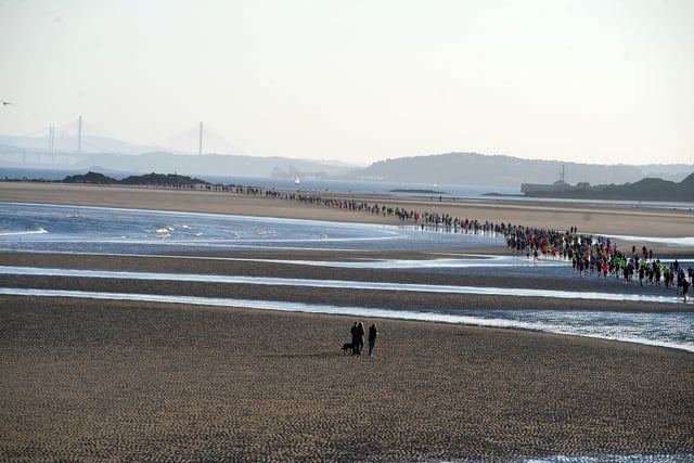 Runners on the sand head to the Black Rock - is there a more stunning setting for a race anywhere in Scotland?