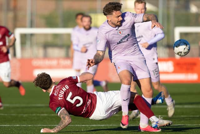 Raith Rovers' George Oakley taking on Stenhousemuir's Sam Young during last weekend's 1-1 draw at Ochilview Park (Pic Alan Harvey/SNS Group)
