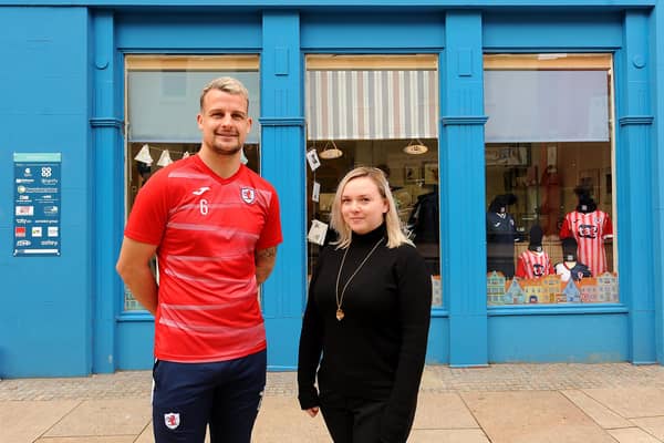 Raith captain Kyle Benedictus and Vicki Hutchison from Enlightenments (Pic: Fife Photo Agency)