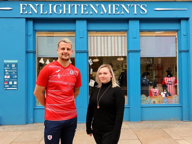 Raith captain Kyle Benedictus and Vicki Hutchison from Enlightenments (Pic: Fife Photo Agency)