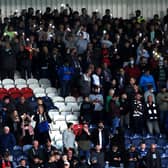 Raith supporters after the lights went out at Stark's Park on Friday night during the derby with Dunfermline (Pic: Fife Photo Agency)