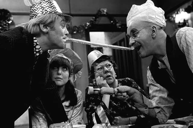 (Left to right) Tony Booth, Una Stubbs, Dandy Nichols, and Warren Mitchell on the set of the BBC comedy Till Death Us Do Part.