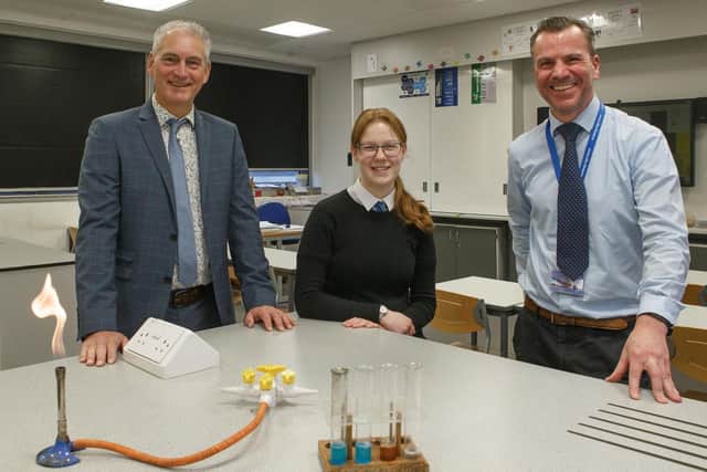 Pictured with Claire McNab are Chris Deaves - Depute Headteacher (left) and Dr McConnachie, chemistry teacher