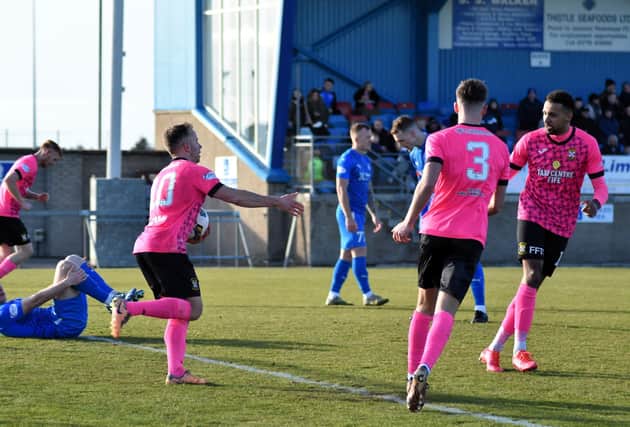 East Fife striker Alan Trouten picks up the ball to restart the match after levelling against Peterhead last Saturday afternoon (Photo: Kenny Mackay)