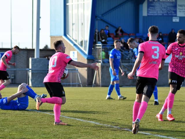 East Fife striker Alan Trouten picks up the ball to restart the match after levelling against Peterhead last Saturday afternoon (Photo: Kenny Mackay)