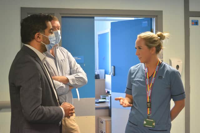Humza Yousaf chats to staff at the Victoria Hospital's Rapid Cancer Diagnostic Service