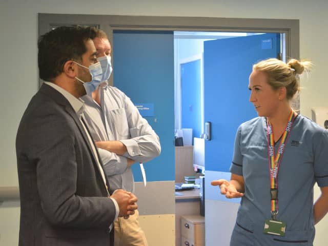 Humza Yousaf chats to staff at the Victoria Hospital's Rapid Cancer Diagnostic Service