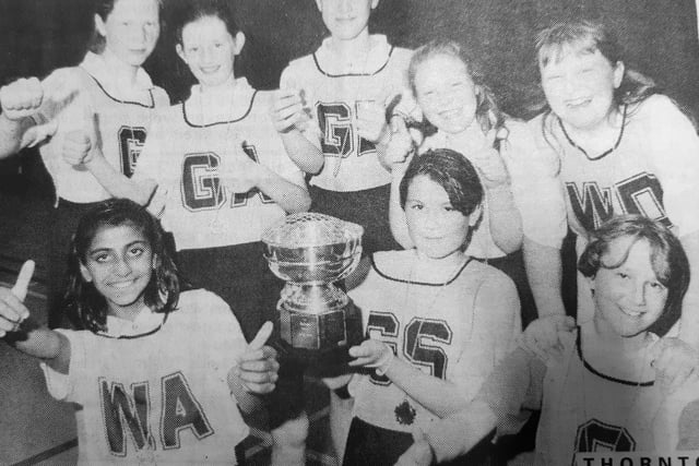 Thornton Primary School netball captain Helena Dalrymple with the trophy the team won after a schools tournament at Fife Institute in the summer of 1996.