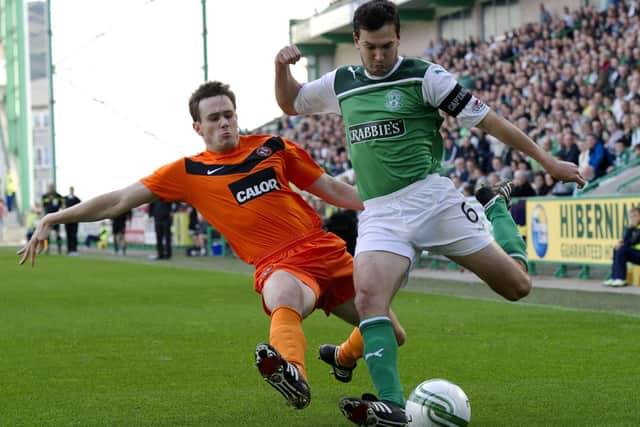 Ian Murray pictured during his playing days with Hibernian, with Dundee United's Keith Watson - who Murray currently has at Raith Rovers - trying to get a block in (Pic by Bill Murray/SNS Group)