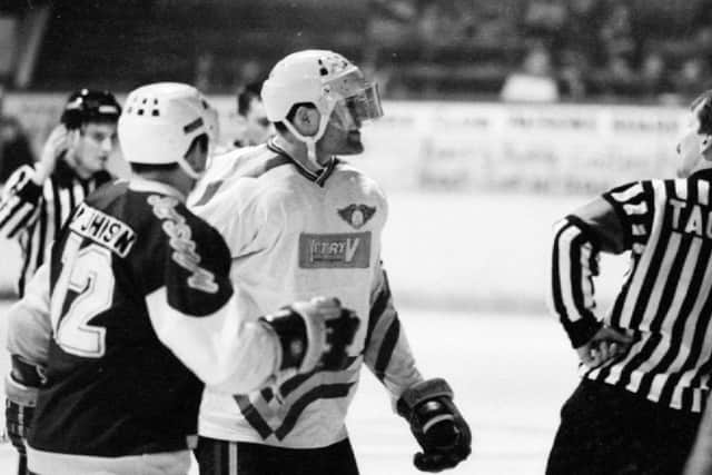 Fife Flyers' defenceman, Mike Rowe, exchanging words with referee Ken Taggart in a  game against Durham Wasps, circa 1989 (Pic: Bill Dickman/Fife Free Press)
