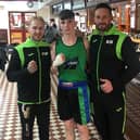 Buckhaven's Faris Tanahill alongside Kingdom Boxing coaches Mathew Fleming and Kevin Bruce (Photo: Contributed)