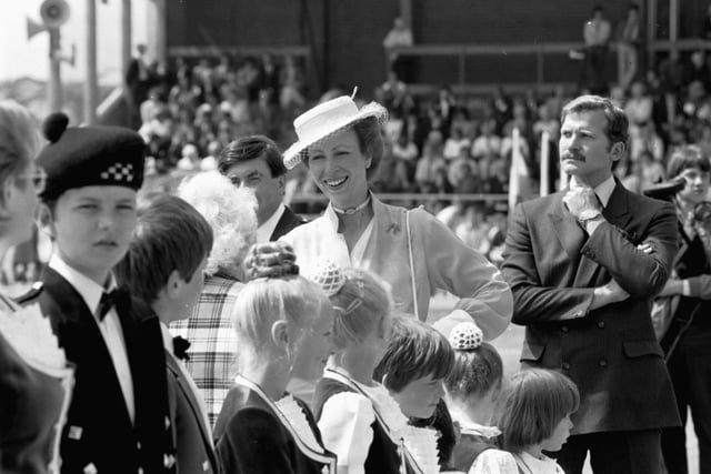 Princess Anne speaking to children from the McKay School of Dancing on a visit to Glenrothes in Fife, July 1984.