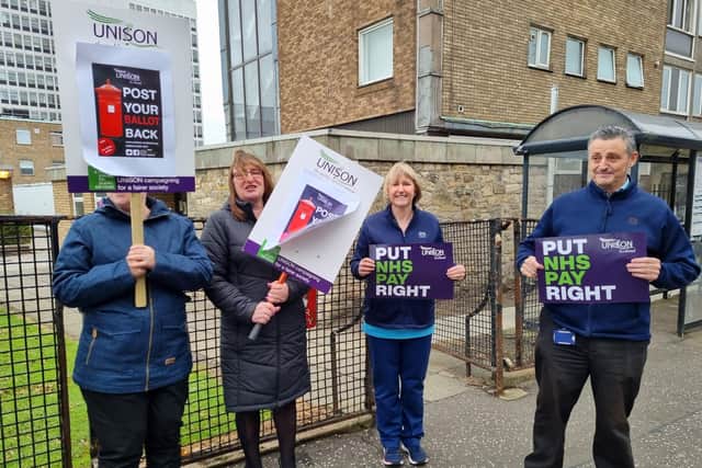 Health staff stage their demo outside the Victoria Hospital