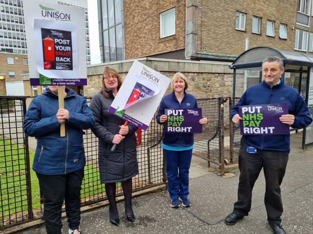 Health staff stage their demo outside the Victoria Hospital