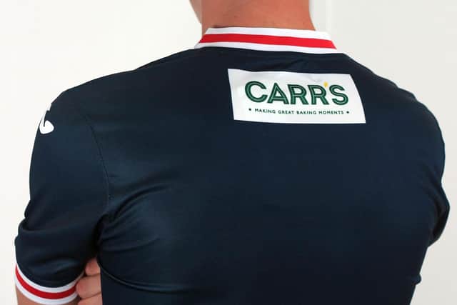 Carrs once again appear on the back of the home top.