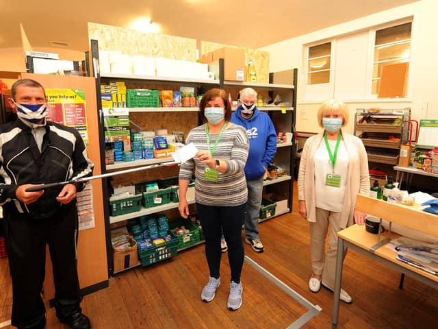 A socially distanced presentation from Yes2 Hub's Roy Mackie to Kirkcaldy Foodbank's Angela Campbell with Craig Dempsey and Thelma Duncan -
credit- Fife Photo Agency.