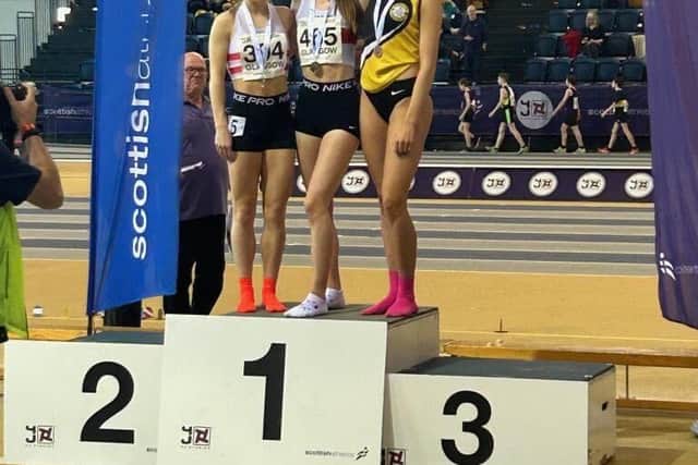 Under 20 Indoor Scottish Championships 400m gold medallist Holly Ovens on podium