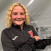 Ruby McDonald with her unsung hero award (Pic: Submitted)