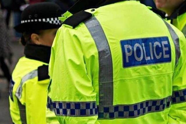 Two teenagers have been arrested and charged in connection with a robbery at a Kirkcaldy shop.