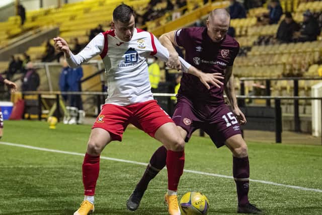 East Fife's Aaron Dunsmore competes with Craig Wighton.  (Photo by Ross Parker/SNS Group)