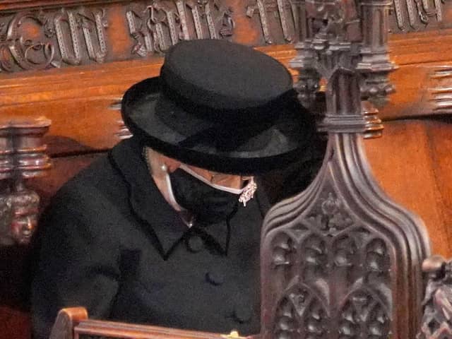 The Queen bows her head during the funeral of the Duke of Edinburgh