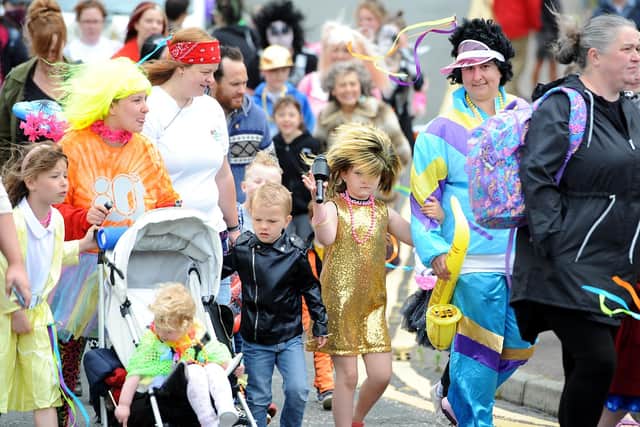 Participants in the 2022 Kinghorn Gala parade, which had a 'Sliding back 70 years' theme.  (Pic: Fife Photo Agency)