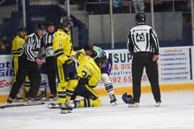 Fife Flyers defenceman Jeremy Masella and Glasgow Clan's Felix Pare drop the gloves (Pic: Jillian McFarlane)