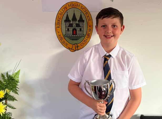 Logan with his Gordon Aikman Charity Cup which was awarded to him from his school, Kirkcaldy High School.