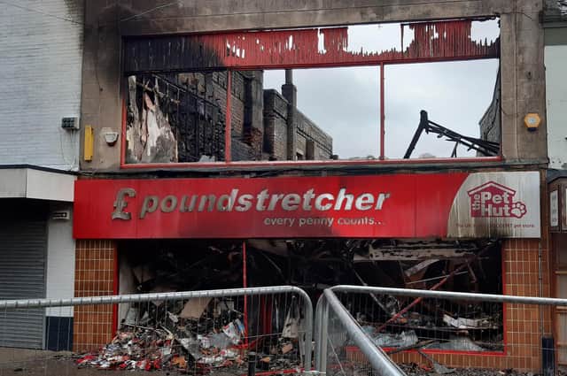 The charred remains of the Poundstretcher store on Leven's High Street  - the building is set to be demolished.
