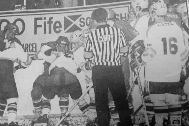 The brutal fight between Mike Rowe and Chris Kelland, Murrayfield Racers, Rowe was branded a "lumberjack" by Racers' coach Leo Koopmans - and it led to an effigy of  the Flyers' player  being hung from the rafters of Murrayfield Ice Rink when the teams played again two weeks later (Pic: Bill Dickman/Fife Freer Press)