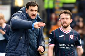 Aidan Connolly gets instructions from Raith boss Ian Murray just before half-time in Saturday's win over Motherwell (Pic Fife Photo Agency)