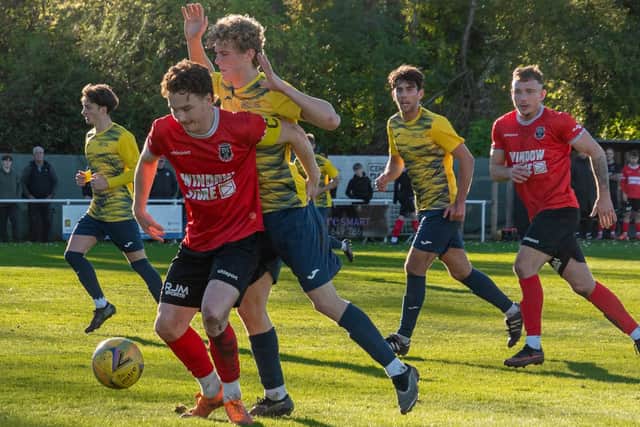 K&D skipper Ynyr Liddell gets wired in v Heriot-Watt