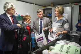 Jonathon Ashworth MP and Gordon Brown chat with Joyce Leggate at Kirkcaldy Foodbank (Pic: Lisa Ferguson)
