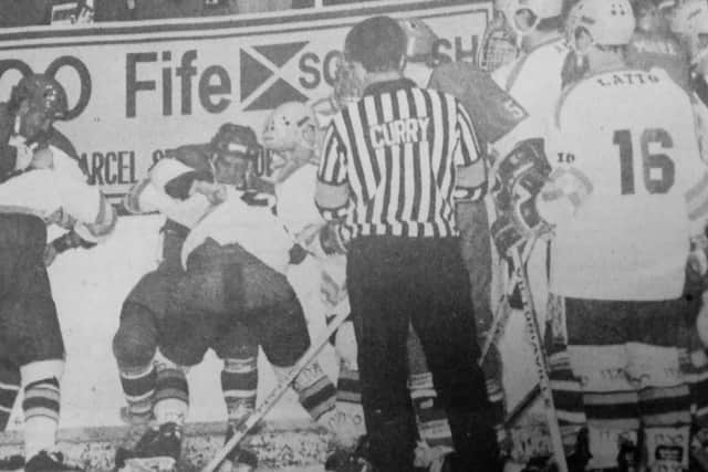 The brawl between Chris Kelland and Mike Rowe at Fife Ice Arena which led to the sickening sight of an effigy of the Fife Flyers player being dangled from a noose the next time the teams met (Pic: Bill Dickman/Fife Free Press)