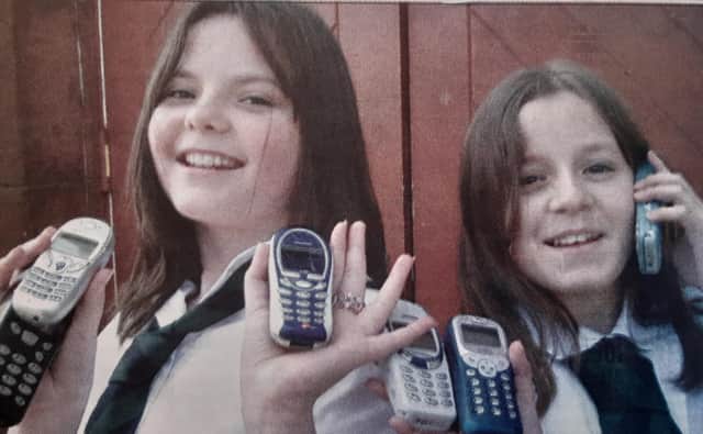 Pupils from Dunnikier Primary School in Kirkcaldy ditched their old mobile phones to help the environment as part of the Fones4Schools initiative. 
They offered their mobiles up for recycling.
Pictured are Kayley Archibald and Siobhan Davidson.