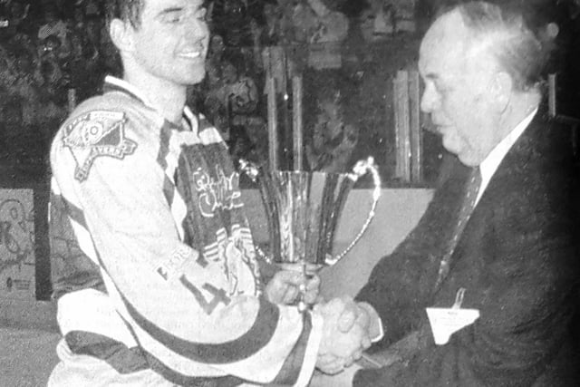 Captain Frank Morris receives the British national Championship trophy in April 1999.
The presentation was made by the late John Brady, former ice rink manager and one of Scotland's finest administrators.