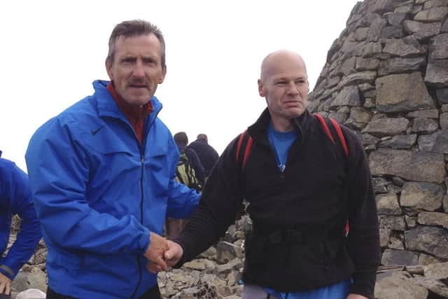 Former East Stirlingshire player Alan Miller and Shire chairman Tony Ford after completing the Parkinson's Ben Nevis Challenge in 2013. Pic: Contributed