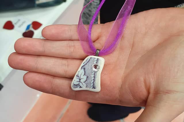 Loraine used some of the pottery shards Alex collected to make jewellery which is on display at the Enlightenments Hub in Kirkcaldy.