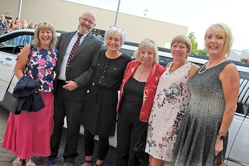 Six members of staff who got a celebrity send off when they retired from Springwell Community College in Staveley in 2018. They are from left, Jill Codrington, Ken Allen, Gill Leake, Carole Clarke, Angela Barston and Debbie Raynor pictured in front of the limousine which brought them in to the school grounds where the whole school including staff and family members greated them with the school song.