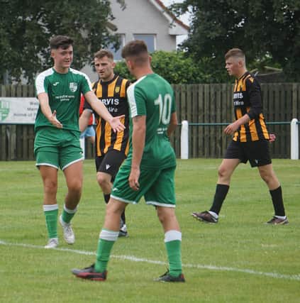 Thornton's Andy McCallion about to thank Robbie Westwaters (10) for providing the assist for his goal against Lochgelly