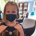 Holly (10) with her freshly chopped locks which she is sending to the Little Princess Trust.