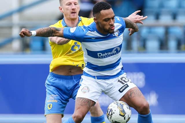 Raith Rovers defender Liam Dick being held off by Greenock Morton's Jai Quitongo during their side's 0-0 draw at Cappielow Park on Saturday (Photo by Roddy Scott/SNS Group)