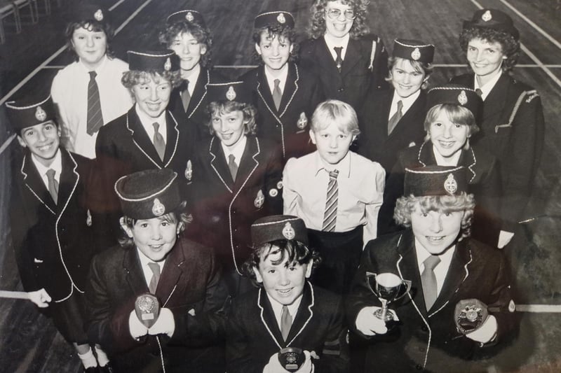 The  seniors and brigadiers sections of the 5th Glenrothes Girls Brigade, pictured in 1988. Front (from left): Sonya Squires (Best Senior); Marie Hetherington (Best Junior); Janet Smith (Best All Rounder) with Captain Mrs Marion Whyte and Brigade Officer, Mrs Alison Oliver.  The photo was taken by David Cruickshanks, Glenrothes Gazette staff photographer.