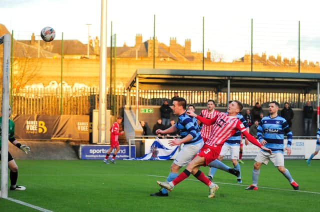 Liam Dick goes close with a first half header. (Pic: Alan Murray)